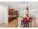 Gourmet kitchen featuring stainless steel appliances, granite countertops, and island with seating at 2803 130Th E Ave, Parrish, FL 34219