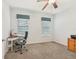 A small office space featuring a desk, chair and blinds on the windows at 2803 130Th E Ave, Parrish, FL 34219