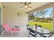 Screened patio perfect for outdoor dining or relaxation with views of the lawn and garden at 2803 130Th E Ave, Parrish, FL 34219