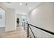 Bright hallway with modern lighting, sleek flooring, and a minimalist design, perfect for a contemporary home at 2904 N Ola Ave, Tampa, FL 33602