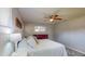 Bedroom features a ceiling fan, a dresser, and a rug at 3075 Rosery Ne Rd, Largo, FL 33771