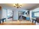 View from dining room of kitchen, living room, and front door at 3075 Rosery Ne Rd, Largo, FL 33771