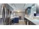 Modern kitchen with stainless steel appliances and sleek countertops, perfect for cooking and entertaining at 3075 Rosery Ne Rd, Largo, FL 33771