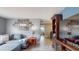 Comfortable living room with a sectional sofa, hardwood floors, and stylish decor throughout at 3075 Rosery Ne Rd, Largo, FL 33771