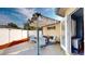 Covered patio features an outdoor seating area with comfortable chairs and a small table at 3075 Rosery Ne Rd, Largo, FL 33771
