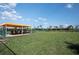 The well maintained dog park includes a covered area to relax in the shade at 31793 Griffin Sands Ln, San Antonio, FL 33576