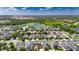 Aerial view showcasing the home's location within a beautiful community at 32628 Harmony Oaks Dr, Wesley Chapel, FL 33545