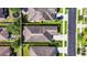 Aerial view of property highlighting the layout of the home and surrounding neighborhood at 32628 Harmony Oaks Dr, Wesley Chapel, FL 33545