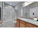 Bathroom features a shower and tub combo and granite countertops at 32628 Harmony Oaks Dr, Wesley Chapel, FL 33545