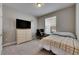 Bedroom featuring neutral walls, carpet floors, and space for a desk at 32628 Harmony Oaks Dr, Wesley Chapel, FL 33545