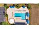 Aerial view of the community pool with cabanas and seating areas at 32628 Harmony Oaks Dr, Wesley Chapel, FL 33545