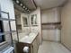 Bathroom featuring a sink, vanity, tile floors and ample storage at 35804 Brisa Dr, Zephyrhills, FL 33541
