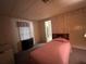 Bedroom featuring carpeted floors and a comfortable space at 35804 Brisa Dr, Zephyrhills, FL 33541