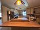 Spacious kitchen with stainless steel appliances and a central island at 35804 Brisa Dr, Zephyrhills, FL 33541