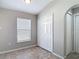 Bedroom featuring natural light and closet space at 36144 Markree Castle Ave, Dade City, FL 33525