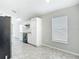 Spacious kitchen showcasing stainless steel appliances, ample counter space, and natural light at 36144 Markree Castle Ave, Dade City, FL 33525