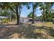 Backyard with enclosed patio at 3622 Tamarix Dr, Tampa, FL 33619