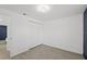 Clean bedroom featuring wood-look flooring, closet, and neutral walls at 3622 Tamarix Dr, Tampa, FL 33619