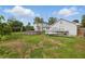 Spacious backyard includes above ground pool and boat in driveway at 4100 1St S Ave, St Petersburg, FL 33711