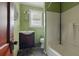 The bathroom features a shower-tub combination and dark vanity at 4100 1St S Ave, St Petersburg, FL 33711