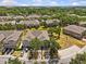 Overhead view of community showcasing the building, manicured grounds, and neighborhood layout at 4105 Bismarck Palm Dr, Tampa, FL 33610