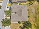 Aerial view of the home's roof, landscaping, and surrounding neighborhood at 4105 Bismarck Palm Dr, Tampa, FL 33610
