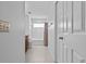 Bathroom boasts a shower-tub combination, vanity, and tiled floor, offering functionality at 4105 Bismarck Palm Dr, Tampa, FL 33610