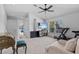 Versatile bonus room with exercise equipment, neutral colors, and ample natural light at 4105 Bismarck Palm Dr, Tampa, FL 33610