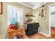 Charming breakfast nook with built-in shelving and a view of the kitchen and backyard at 4124 W San Juan St, Tampa, FL 33629