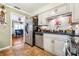 Efficient kitchen with stainless steel appliances, ample counter space, and view into the adjacent living area at 4124 W San Juan St, Tampa, FL 33629