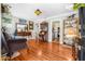 Comfortable living room with hardwood floors, classic furnishings, and a view into the kitchen at 4124 W San Juan St, Tampa, FL 33629