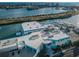 Aerial shot of Clearwater Marine Aquarium with waterfront and city skyline in the background at 415 Island Way # 511, Clearwater Beach, FL 33767