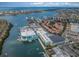 Breathtaking aerial view of the marina, waterways, and surrounding residential area at 415 Island Way # 511, Clearwater Beach, FL 33767