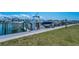 View of several boats docked along the water, showing the luxurious boating lifestyle available to homeowners at 415 Island Way # 511, Clearwater Beach, FL 33767