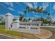 Island Estates monument sign with palm trees and landscaping, a sunny view at 415 Island Way # 511, Clearwater Beach, FL 33767