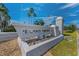 Beautiful community sign: Island Estates, welcomes residents and guests with beautiful tropical landscaping at 415 Island Way # 511, Clearwater Beach, FL 33767