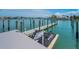 View of Jet Skis on a dock, highlighting the recreational waterfront lifestyle available to homeowners at 415 Island Way # 511, Clearwater Beach, FL 33767