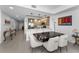 Stylish kitchen with stainless steel appliances, an island, and open to the dining area at 415 Island Way # 511, Clearwater Beach, FL 33767
