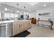 Bright kitchen featuring pendant lighting, stainless steel appliances, and a spacious island at 415 Island Way # 511, Clearwater Beach, FL 33767