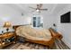 Well-lit main bedroom with a large window, ceiling fan, and spacious layout at 415 Island Way # 511, Clearwater Beach, FL 33767