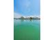 A peaceful view of the waterfront, highlighting the serene and natural surroundings of the property at 415 Island Way # 511, Clearwater Beach, FL 33767