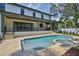 Swimming pool and patio with spa and outdoor entertainment area at 4224 W Corona St, Tampa, FL 33629
