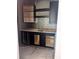 New bar area features sleek cabinetry and wine fridge at 4224 W Corona St, Tampa, FL 33629