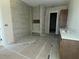Newly tiled bathroom featuring a large shower with a built-in bench at 4224 W Corona St, Tampa, FL 33629