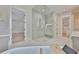 Spacious bathroom featuring a walk-in shower and tub at 4224 W Corona St, Tampa, FL 33629