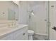 Bathroom with a white vanity, framed glass shower, and modern fixtures for a clean, luxurious feel at 4224 W Corona St, Tampa, FL 33629