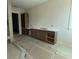 Bathroom featuring a spacious vanity with modern countertop and cabinetry at 4224 W Corona St, Tampa, FL 33629