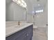 Modern bathroom featuring a tub/shower, sleek vanity, stylish lighting, and contemporary fixtures at 4224 W Corona St, Tampa, FL 33629