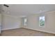 Well-lit bedroom featuring neutral walls, white trim, recessed lighting, and warm wood floors at 4224 W Corona St, Tampa, FL 33629