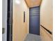 Interior elevator with geometric floor tile and industrial-style door at 4224 W Corona St, Tampa, FL 33629